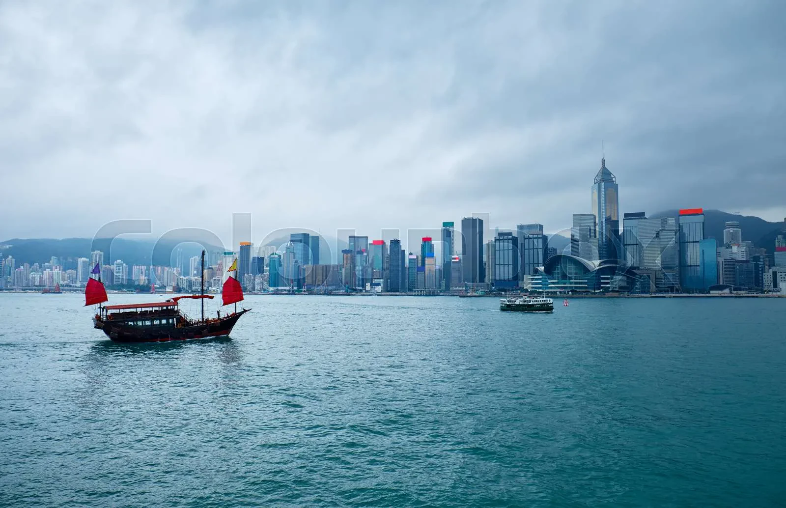 Hong Kong skyline with airplane model in foreground