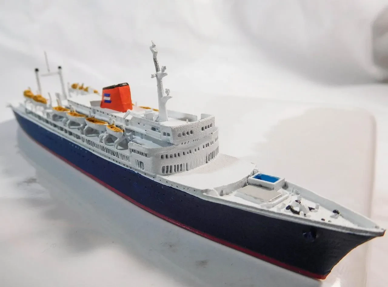 Detailed diecast model of a modern cruise ship