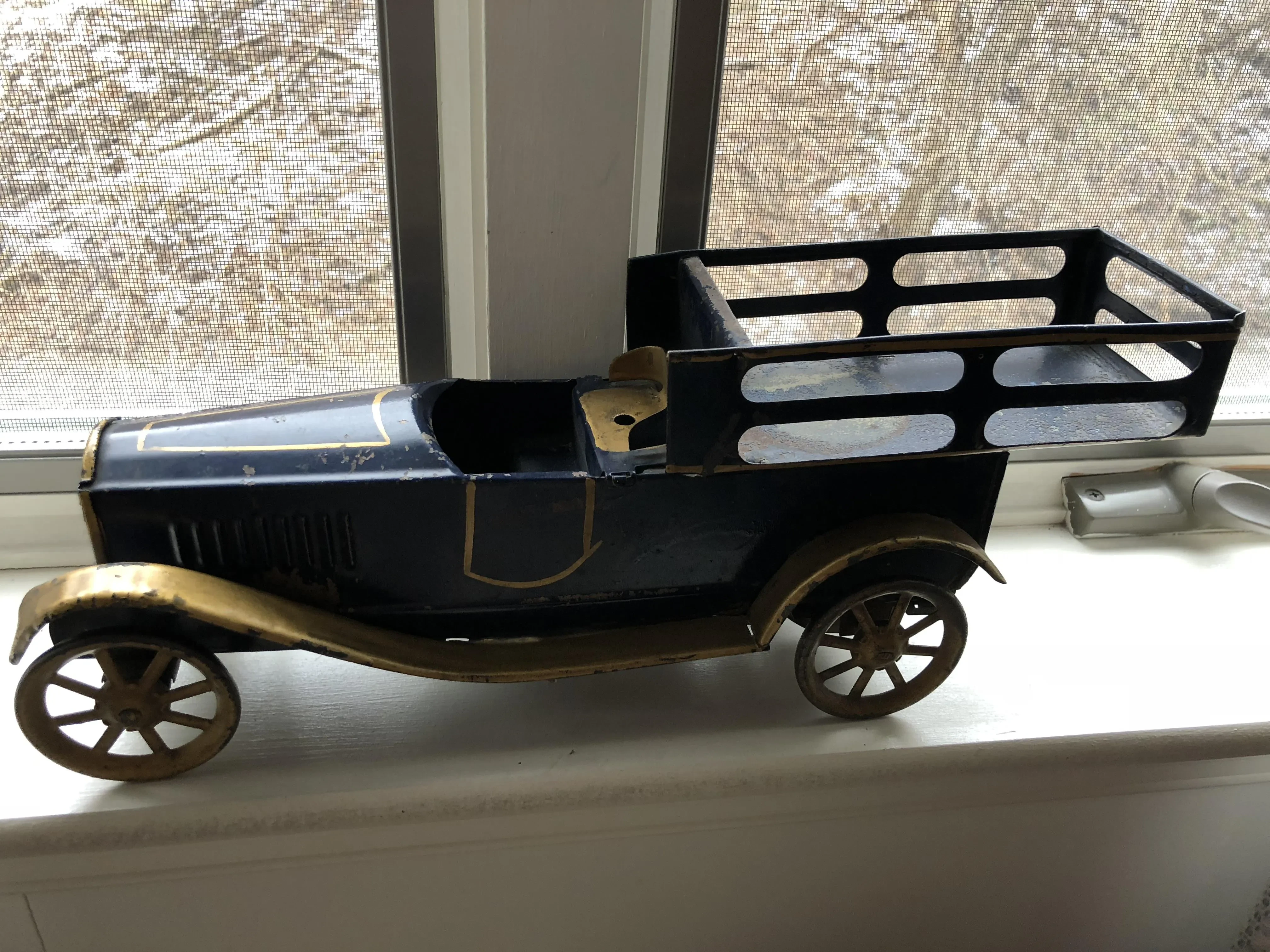Early tin toy car